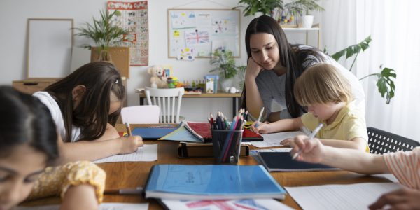 side-view-teacher-watching-kids